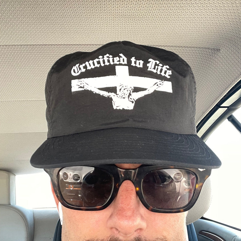 Crucified to Life hat worn, front view